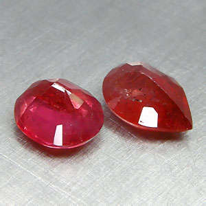 2.26ctw Orange red SAPPHIRE oval / pear set