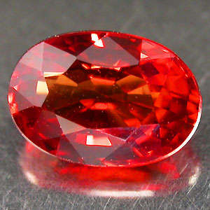 0.68ct Orange red SAPPHIRE oval facet