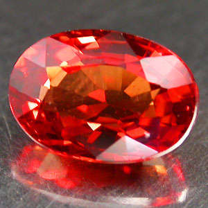 0.68ct Orange red SAPPHIRE oval facet