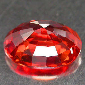0.68ct Orange red SAPPHIRE oval facet