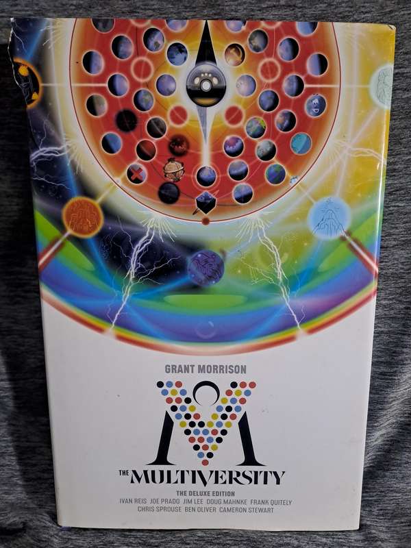 The Multiversity The Deluxe [ISBN 9781401256821](DC Comics)(Tear on dust Jacket)