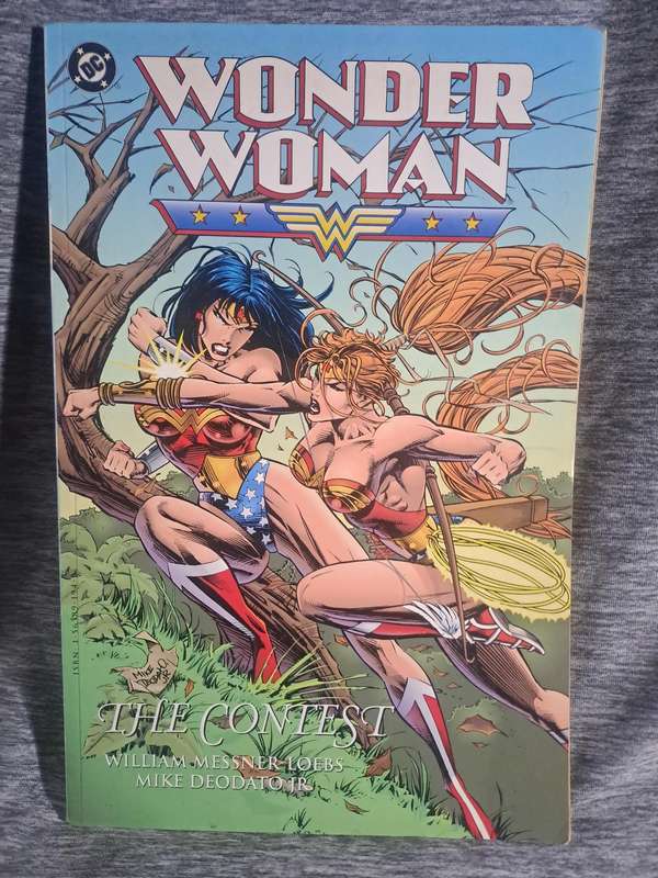 Wonder Woman The Contest [ISBN 1852866373](DC Comics)(slight tear on intro page)