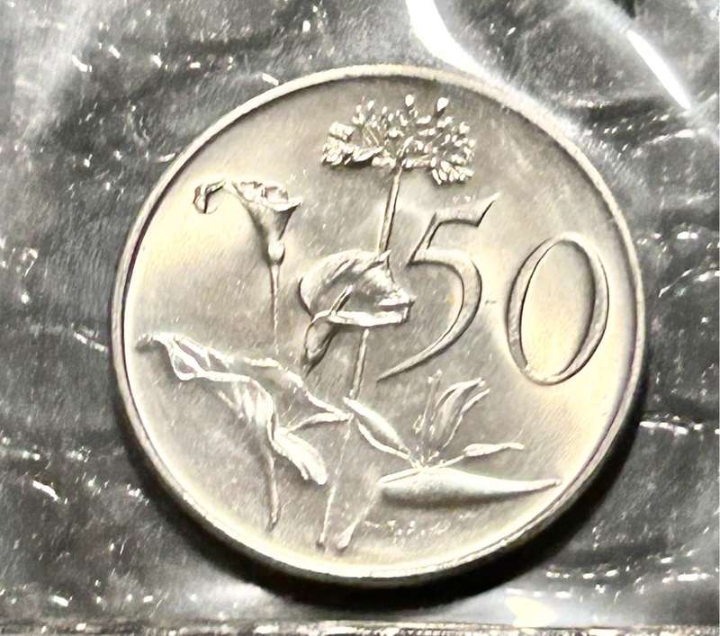 1974 UNC MINTPACK WITH COLLECTABLE R1 and 1/2CENT
