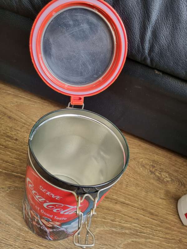 Coca Cola branded gift tin and rugby scarf.