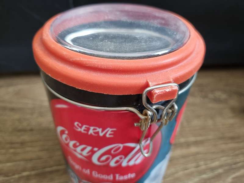 Coca Cola branded gift tin and rugby scarf.