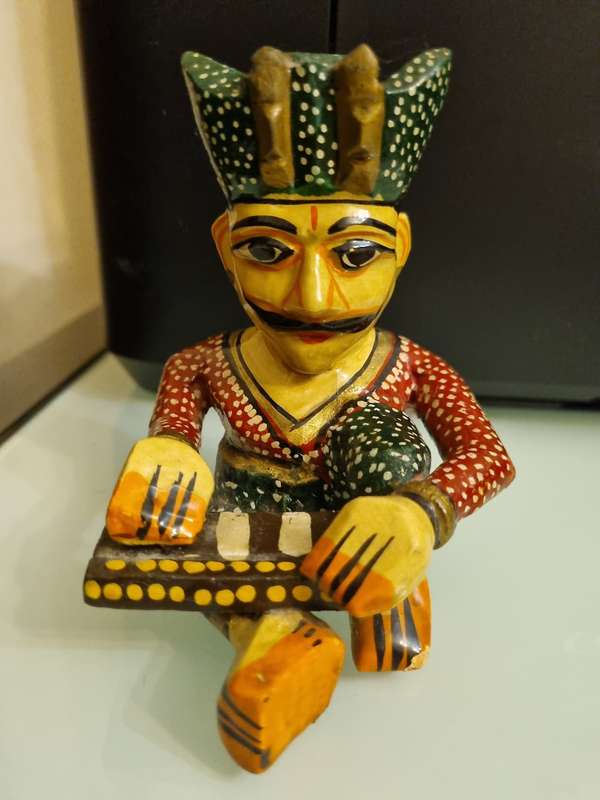 Wooden Statuette - Man playing instrument & Beaded necklace.