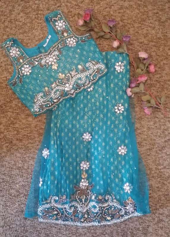 GIRLS TURQUOISE AND BEADED LEHENGA Says size 20.
