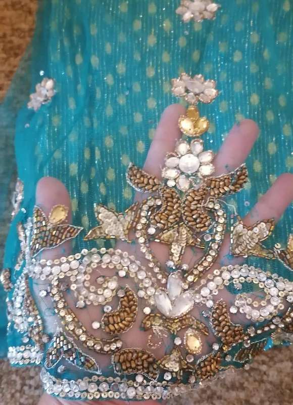 GIRLS TURQUOISE AND BEADED LEHENGA Says size 20.