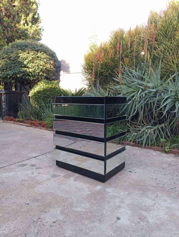 Side table with a glass finish