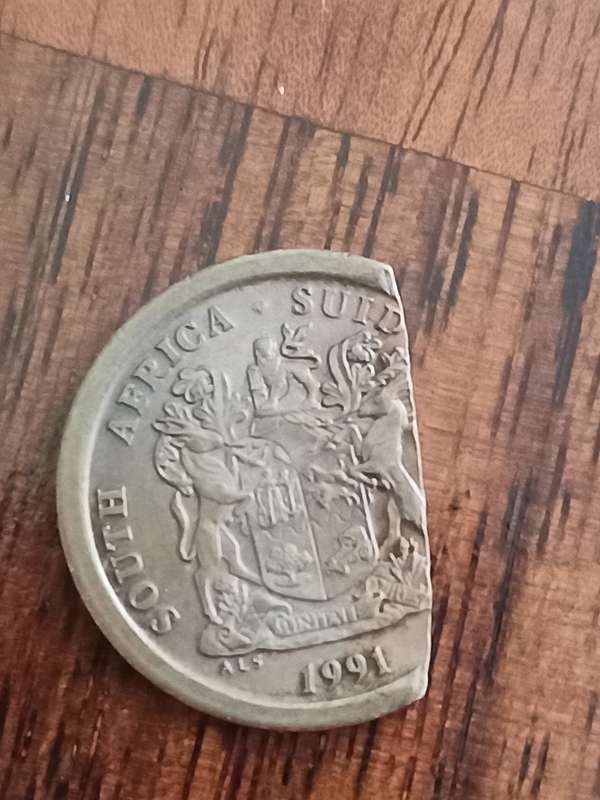 Collectors clipped planchet error 5c coin