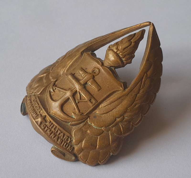 Early SADF Military Gymnasium Cap Badge.  Lugs Intact.