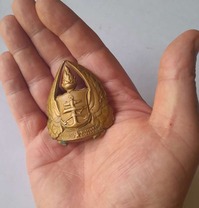 Early SADF Military Gymnasium Cap Badge.  Lugs Intact.