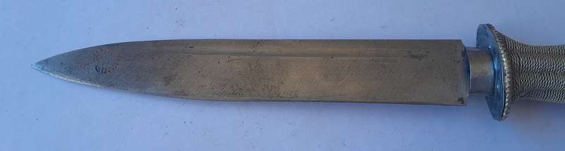 Antique Bhutanese Belt Mounted Dagger with Embossed Scabbard.