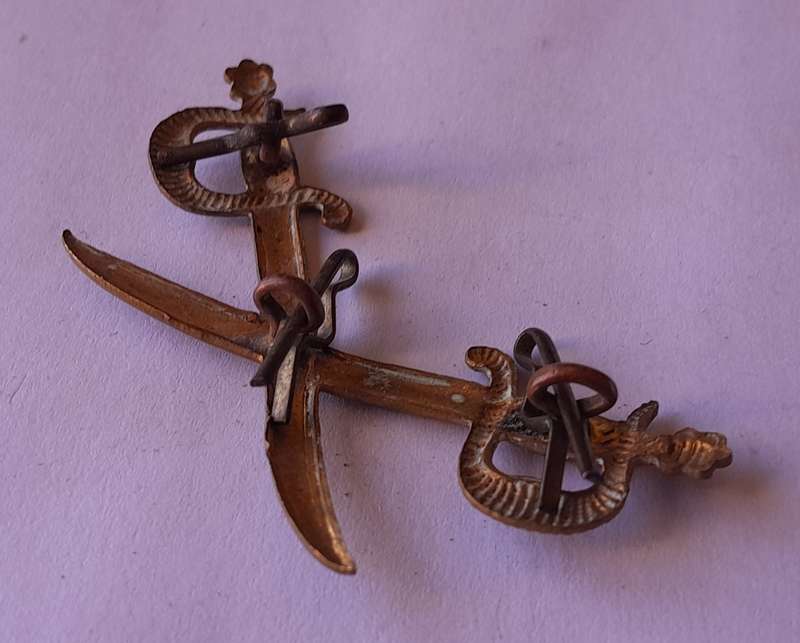 WW2 British Army PT Instructor Cap Badge. All Lugs Intact.