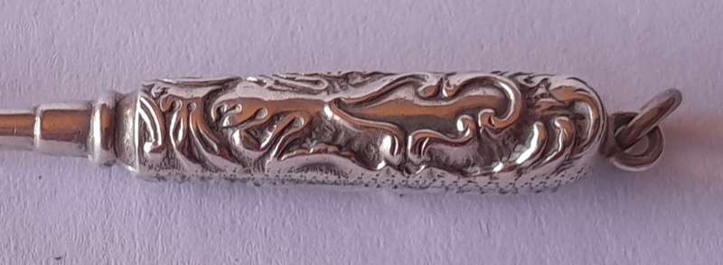 Edwardian All Solid Silver Miniature Glove Hook Pendant. Adie & Lovekin, Birmingham.