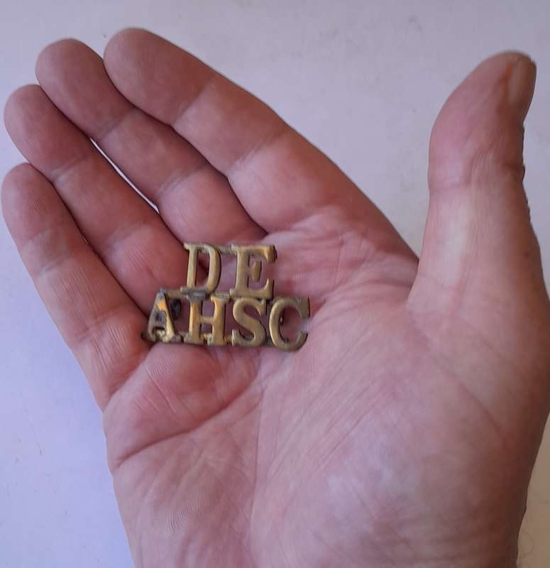 Early DEAHSC Brass Shoulder Title. Lugs Intact.