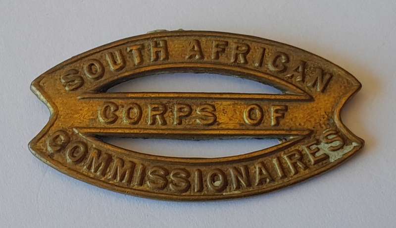Rare SA Corps of Commissionaires Cap Badge.  No Lugs.