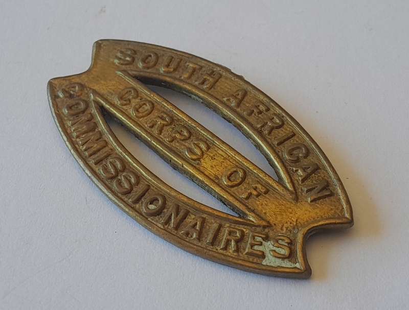 Rare SA Corps of Commissionaires Cap Badge.  No Lugs.