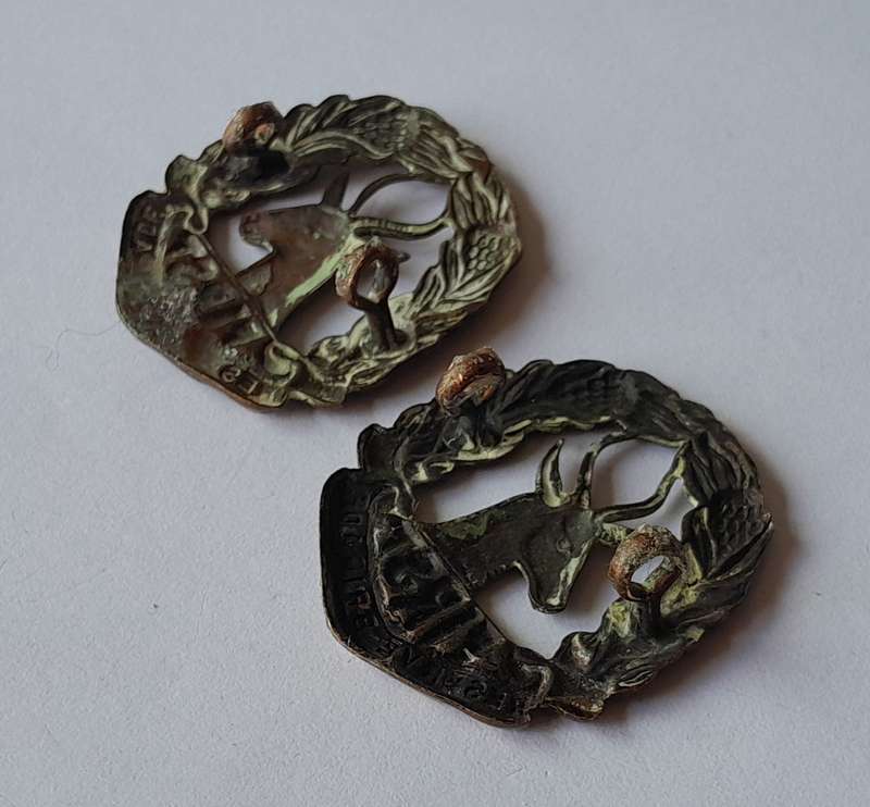 Pair WW2 SA Army First Reserve Brigade Collar Badges.  Lugs Intact.