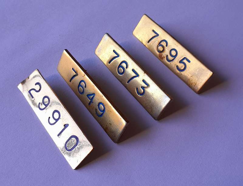 Collection Early SAP Metal Number Badges.