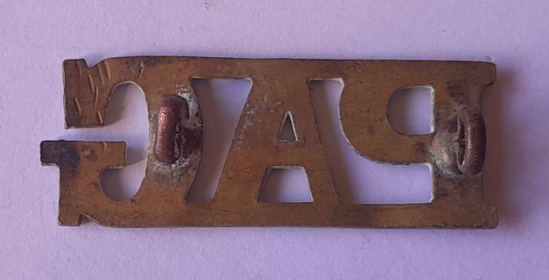Prince Alfred's Guard Brass Shoulder Title (1894 - 1913).  Lugs Intact.