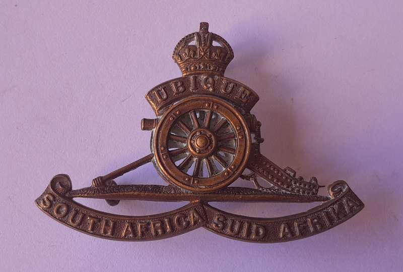 WW2 SA Artillery Cap Badge.  Rotating Wheel.  Lugs Intact.