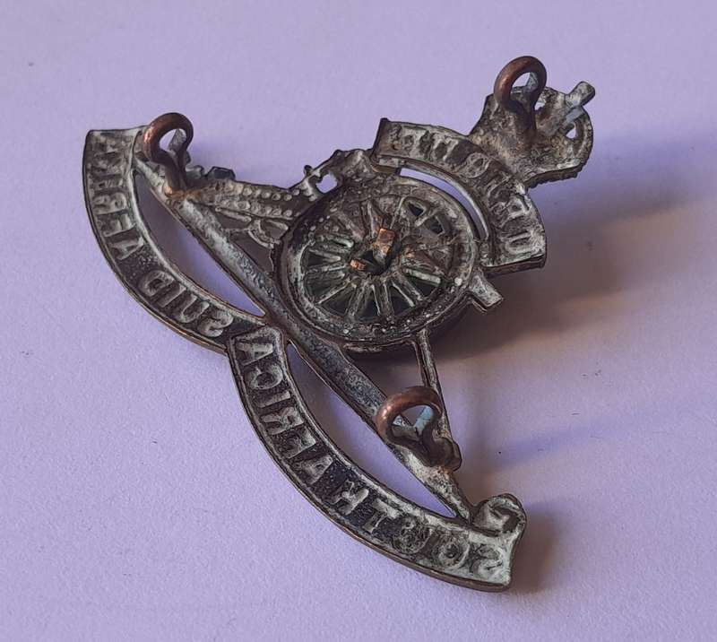 WW2 SA Artillery Cap Badge.  Rotating Wheel.  Lugs Intact.