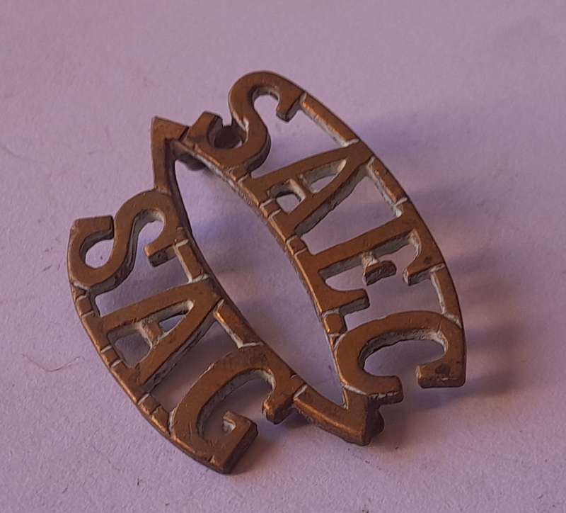 Early SA Engineers Corps Brass Shoulder Title.  1 Lug Intact.