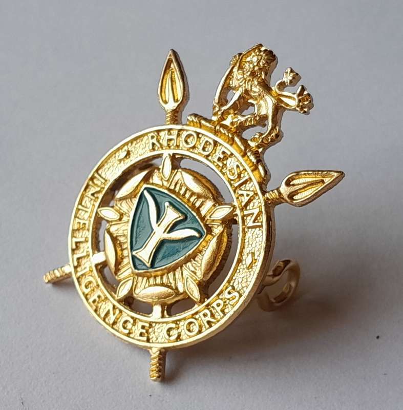 Rhodesian Intelligence Corps Badge.  Lugs Intact.