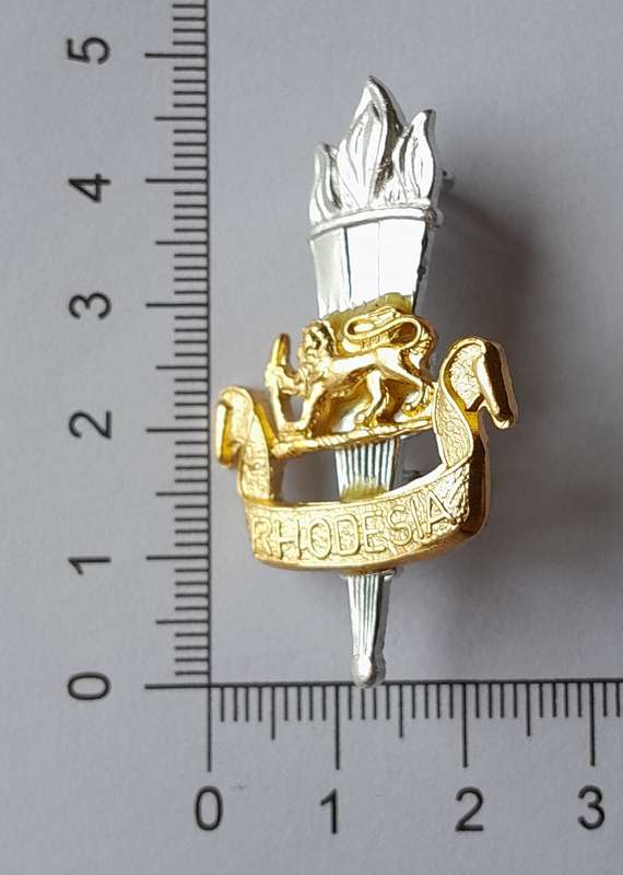 Rhodesian Army Education Corps Cap Badge.  Lugs Intact.