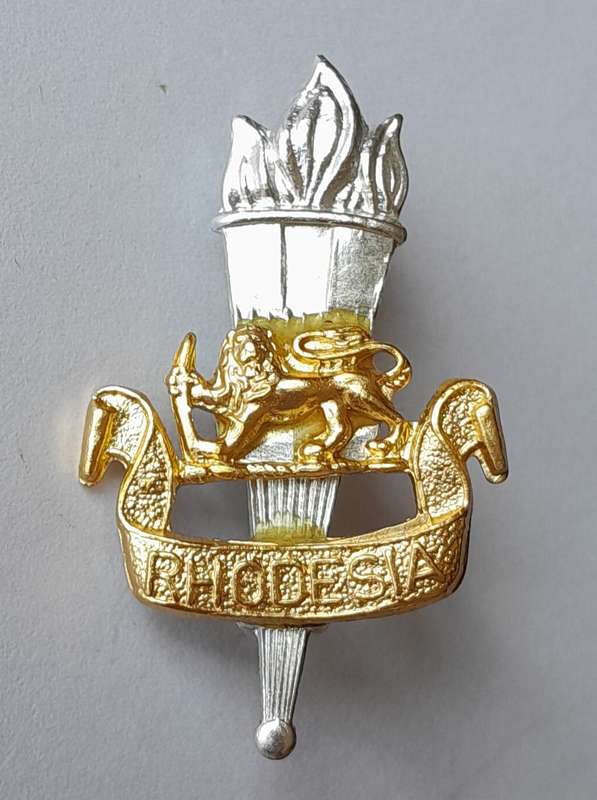 Rhodesian Army Education Corps Cap Badge.  Lugs Intact.