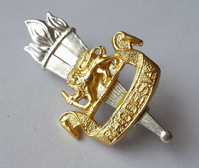 Rhodesian Army Education Corps Cap Badge.  Lugs Intact.