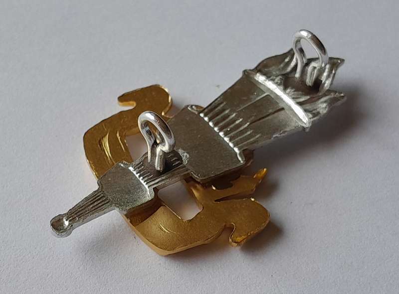 Rhodesian Army Education Corps Cap Badge.  Lugs Intact.