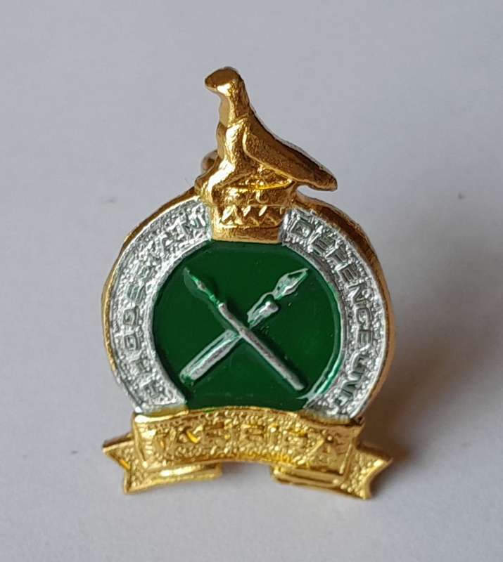 Rhodesian Army Defense Unit Badge.  Lugs Intact.