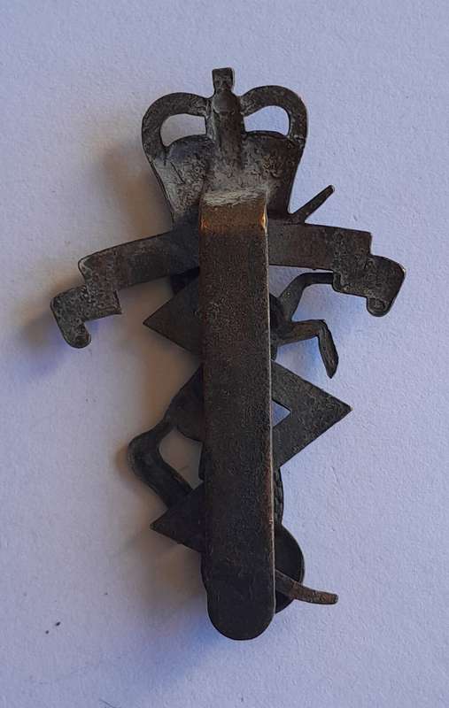 WW2 Royal Electrical Mechanical Engineers Cap Badge.  Slider Intact.