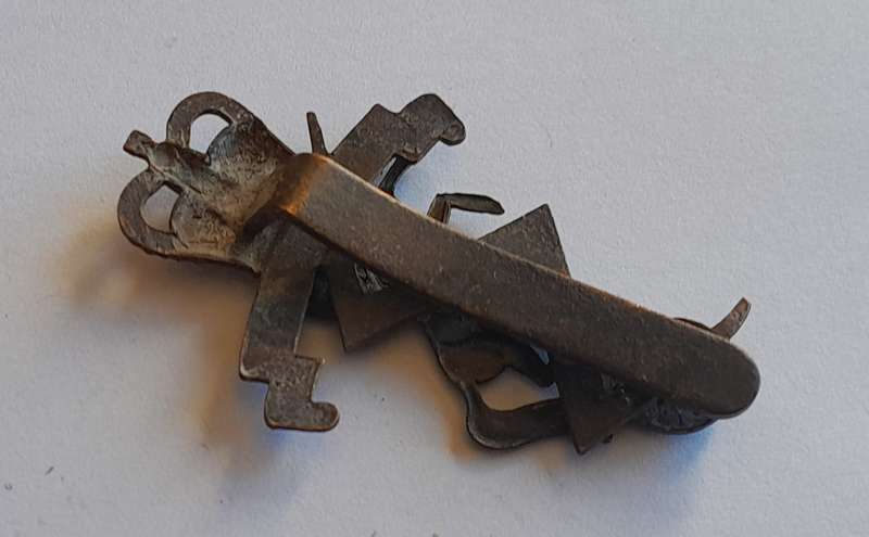 WW2 Royal Electrical Mechanical Engineers Cap Badge.  Slider Intact.