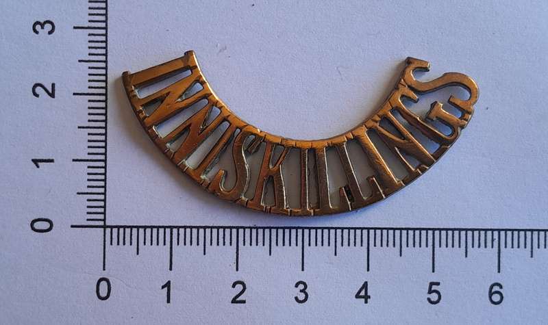 Early Royal Inniskilling Fusiliers Brass Shoulder Title.  No Lugs.