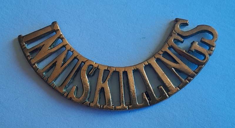 Early Royal Inniskilling Fusiliers Brass Shoulder Title.  No Lugs.