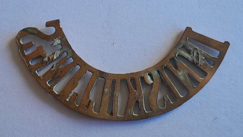Early Royal Inniskilling Fusiliers Brass Shoulder Title.  No Lugs.