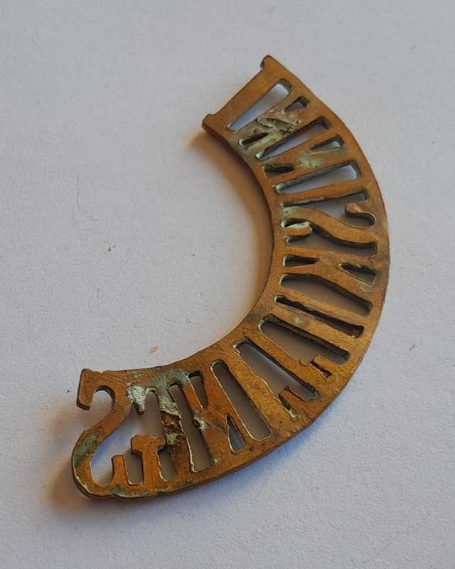 Early Royal Inniskilling Fusiliers Brass Shoulder Title.  No Lugs.