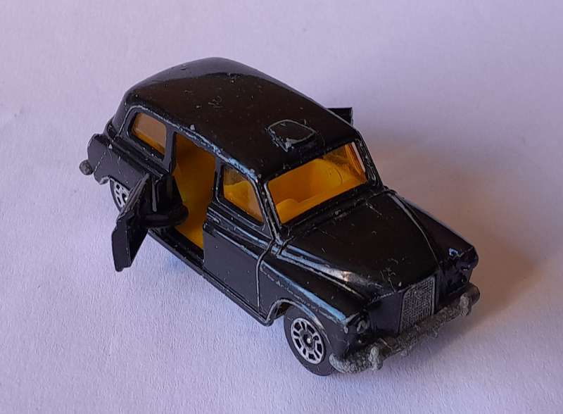 1970's Corgi Die Cast London Taxi.  Opening Doors.