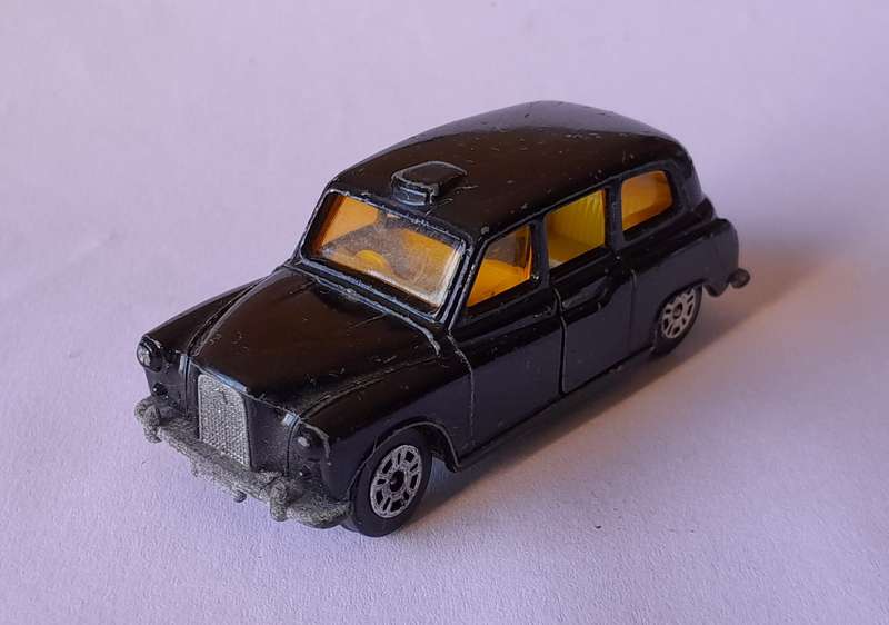 1970's Corgi Die Cast London Taxi.  Opening Doors.