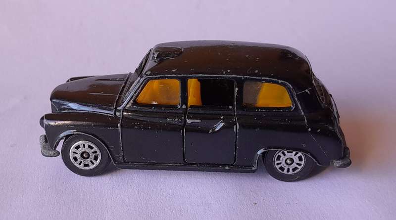 1970's Corgi Die Cast London Taxi.  Opening Doors.