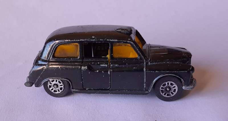 1970's Corgi Die Cast London Taxi.  Opening Doors.