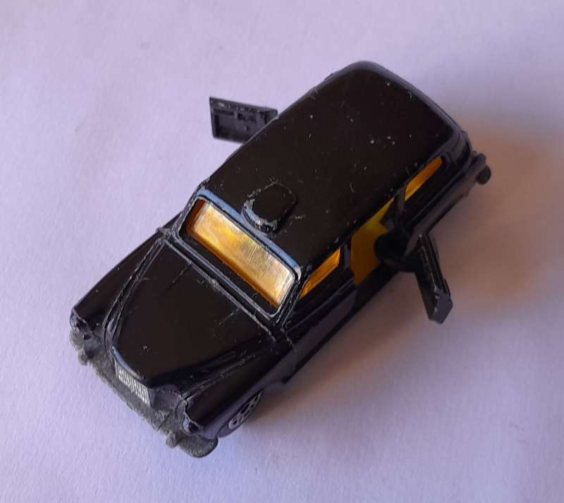 1970's Corgi Die Cast London Taxi.  Opening Doors.