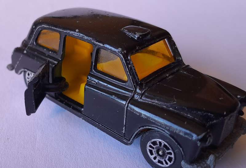 1970's Corgi Die Cast London Taxi.  Opening Doors.