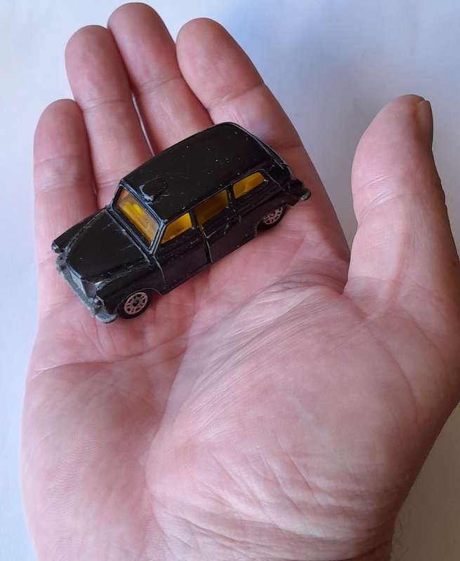 1970's Corgi Die Cast London Taxi.  Opening Doors.