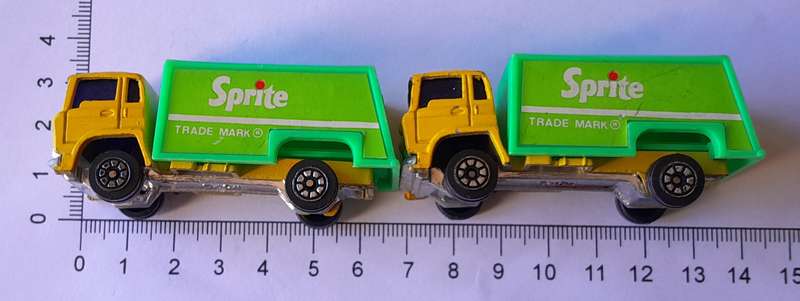Vintage Pair Die Cast and Plastic Ford "Sprite" Trucks.