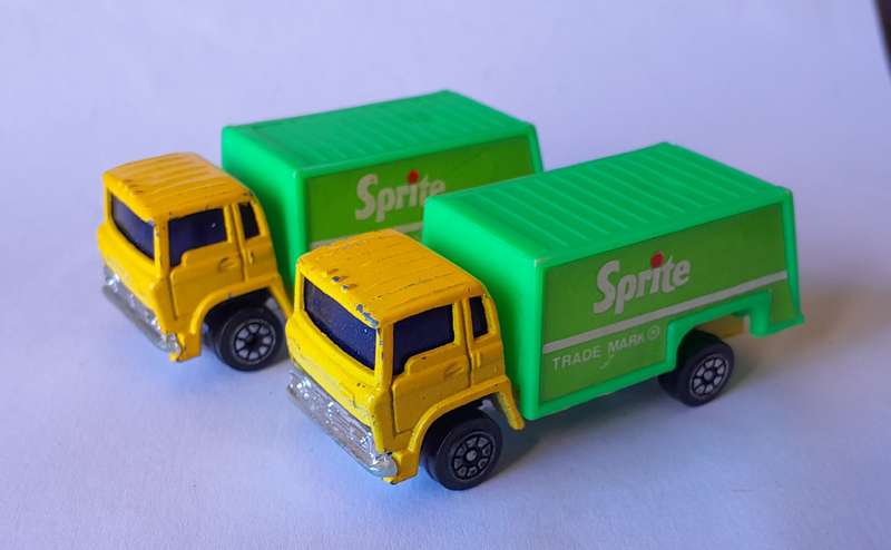 Vintage Pair Die Cast and Plastic Ford "Sprite" Trucks.