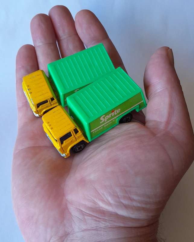 Vintage Pair Die Cast and Plastic Ford "Sprite" Trucks.
